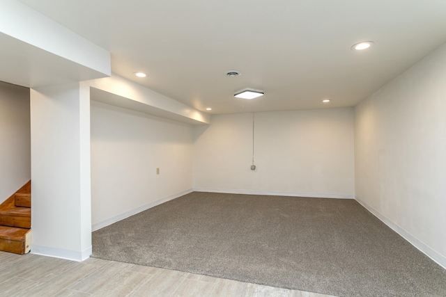 basement with light carpet