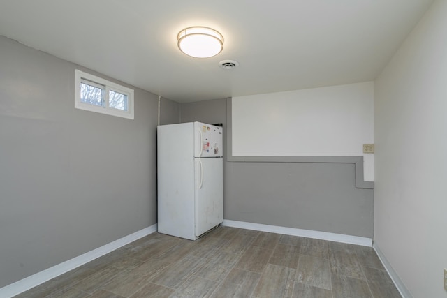 interior space featuring white fridge