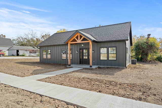 view of front of property featuring cooling unit