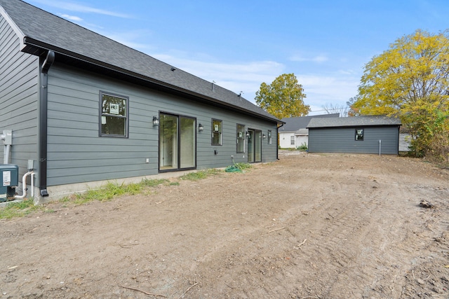 back of property with cooling unit