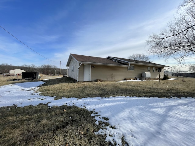 view of snow covered property