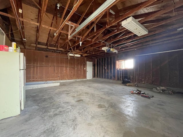 garage with white refrigerator