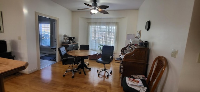 office area featuring ceiling fan and light wood-type flooring