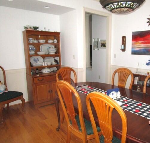 dining space featuring hardwood / wood-style flooring