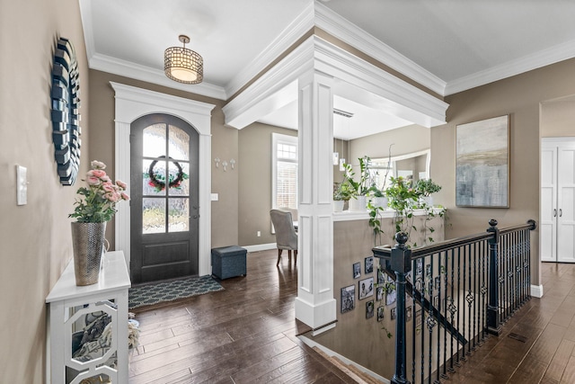 entryway featuring crown molding and dark wood-type flooring