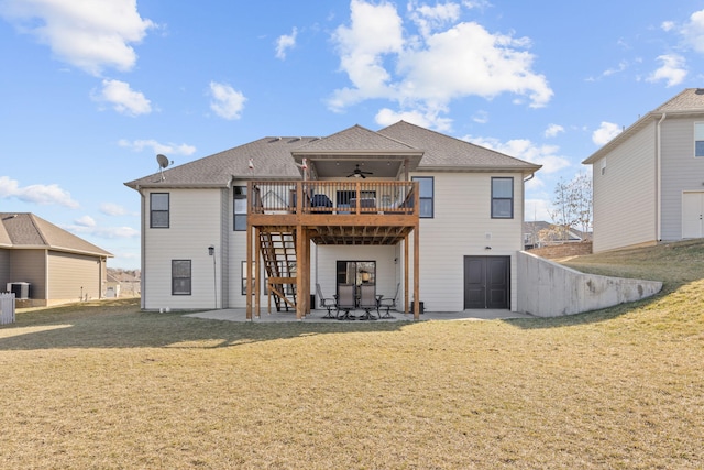 back of house featuring a patio area, central air condition unit, a yard, a wooden deck, and ceiling fan