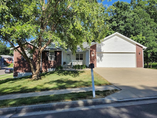 single story home with a garage and a front lawn