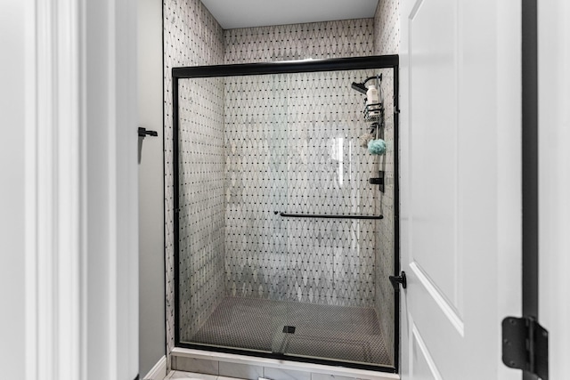 bathroom with an enclosed shower