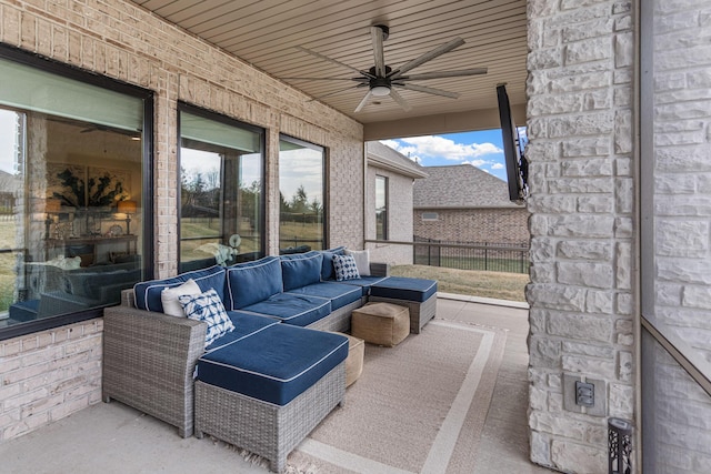 view of patio featuring outdoor lounge area and ceiling fan