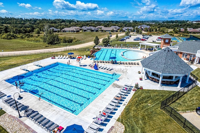 view of pool featuring a yard, a patio, and a gazebo