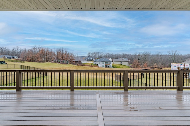 deck featuring a lawn