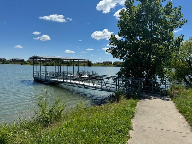 dock area featuring a water view