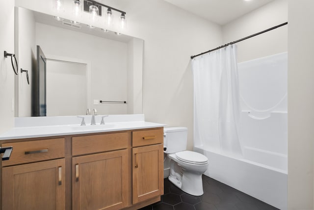 bathroom featuring vanity, tile patterned floors, shower / bath combination with curtain, and toilet