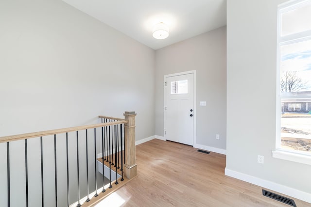 entrance foyer featuring light wood-type flooring