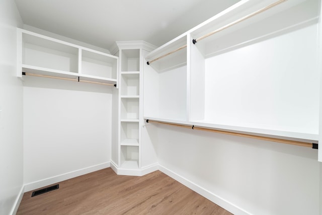 walk in closet featuring light wood-type flooring