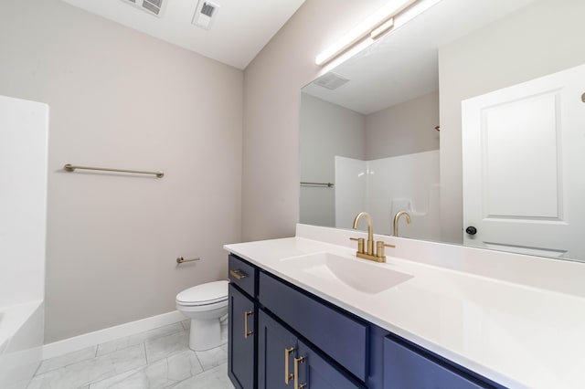 bathroom with vanity and toilet