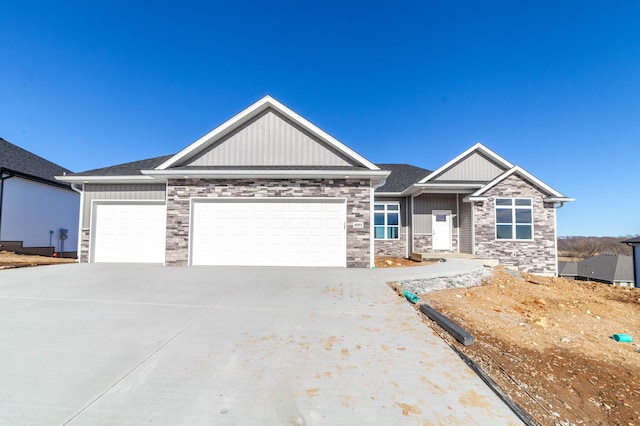 craftsman-style home with a garage