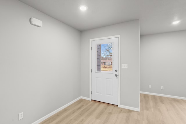 foyer with light wood-type flooring