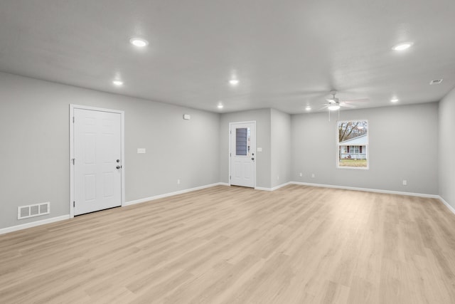 interior space with light hardwood / wood-style flooring and ceiling fan