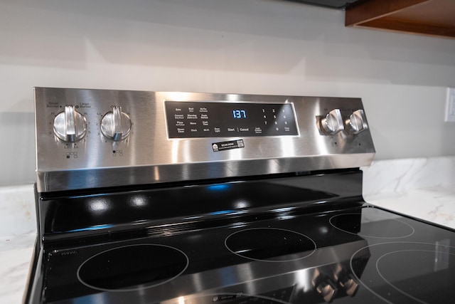 interior details featuring stainless steel electric range oven