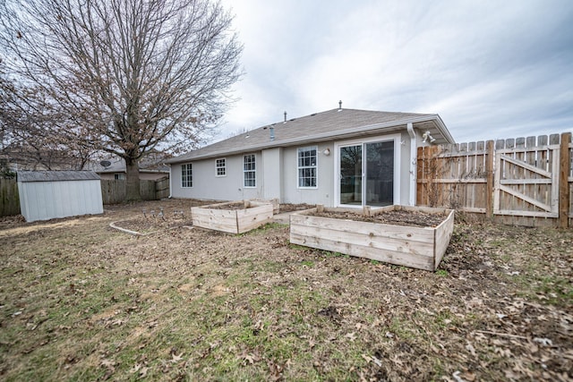 back of property with a storage unit