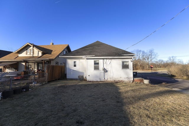 rear view of property with central air condition unit