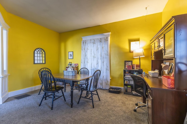 view of carpeted dining room