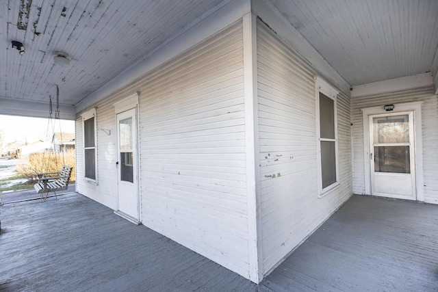 doorway to property with a porch