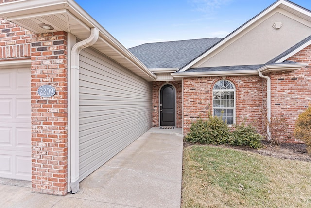 property entrance featuring a garage