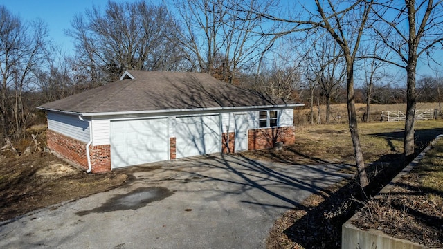 garage with driveway