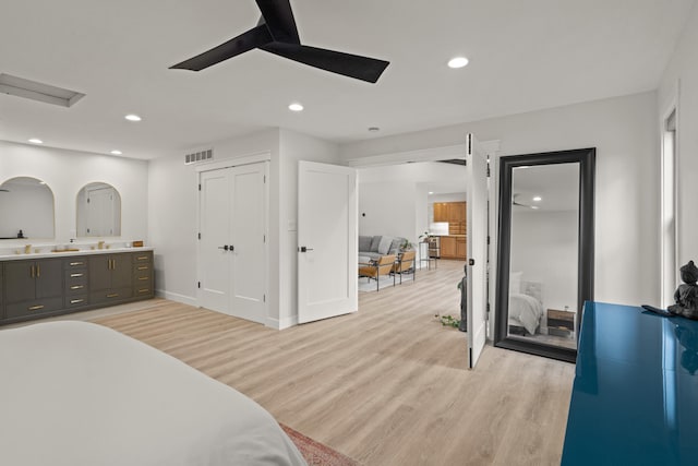 bedroom with recessed lighting, baseboards, visible vents, and light wood finished floors