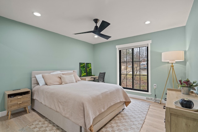 bedroom featuring baseboards, ceiling fan, recessed lighting, and light wood-style floors