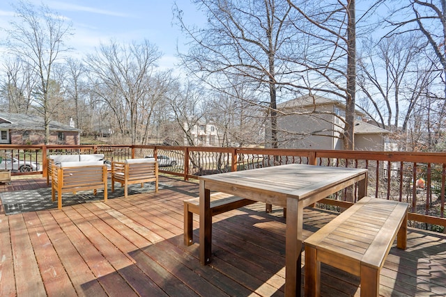 deck featuring outdoor lounge area