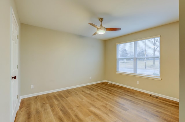 unfurnished room featuring ceiling fan and light hardwood / wood-style floors