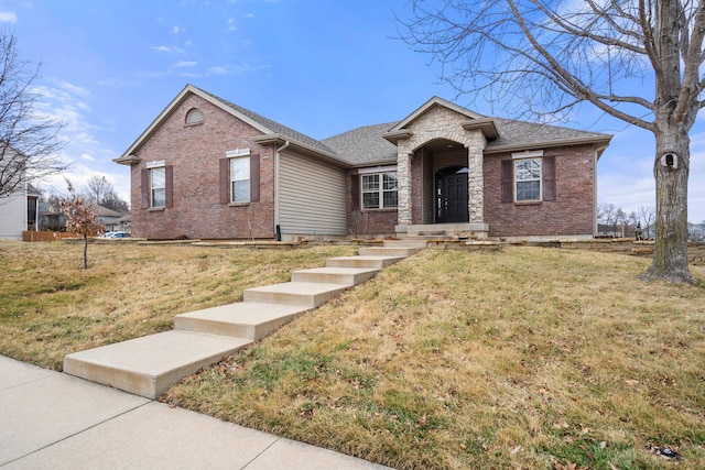 ranch-style house with a front lawn