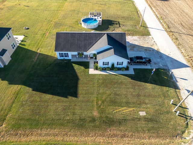 birds eye view of property featuring a rural view