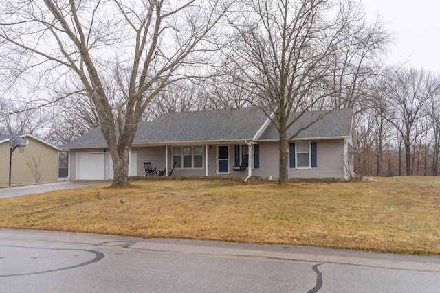 ranch-style home with a garage and a front yard