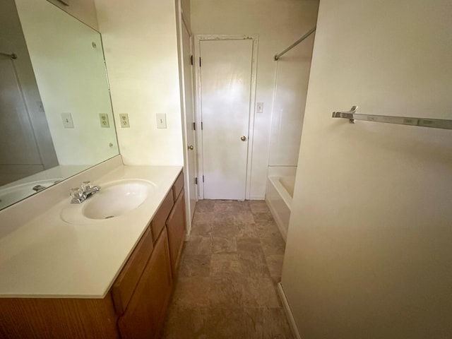 bathroom featuring vanity and shower / washtub combination