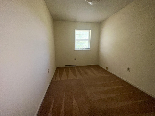 empty room featuring carpet floors