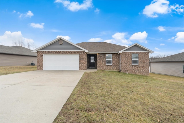 ranch-style house with a garage and a front lawn