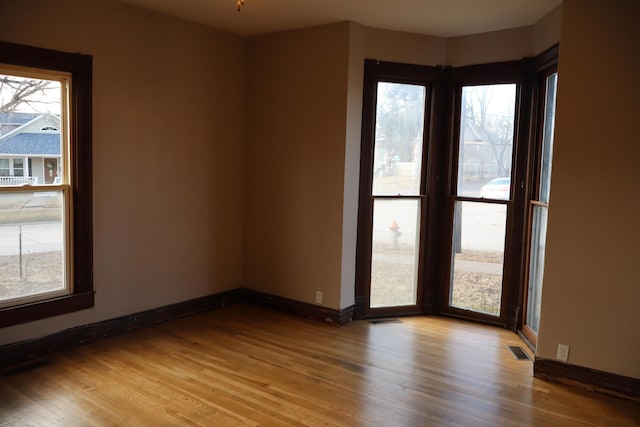 empty room featuring hardwood / wood-style flooring