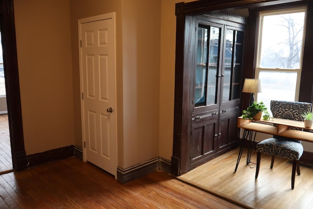 interior space with hardwood / wood-style flooring