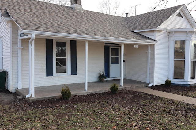 entrance to property with a porch