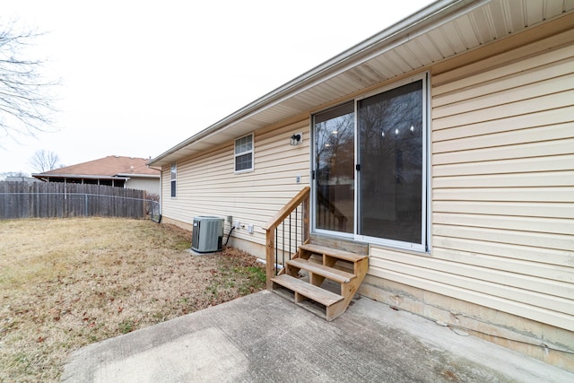 exterior space featuring cooling unit and a patio area