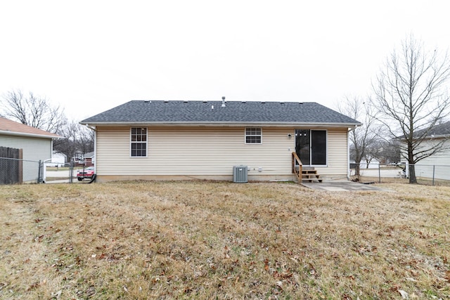 back of property featuring a patio, a yard, and central air condition unit