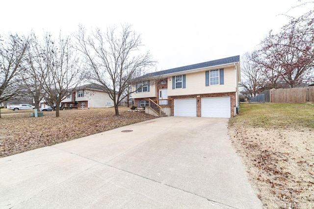 split foyer home featuring a garage