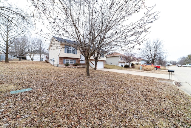 view of yard with a garage