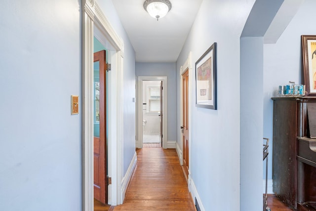 hall with light wood-type flooring