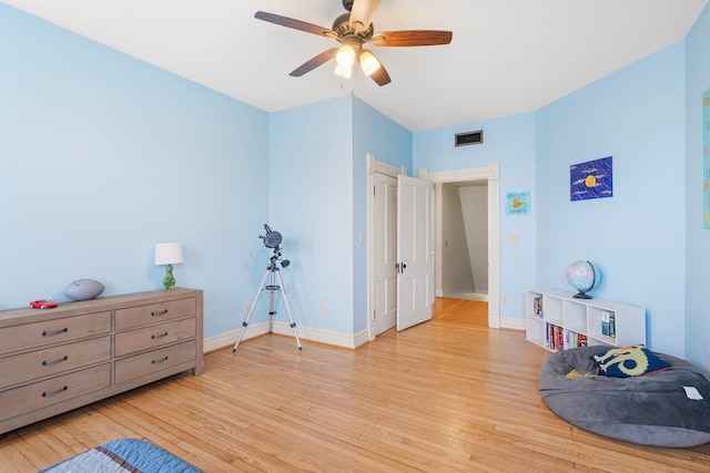 interior space with ceiling fan and light hardwood / wood-style floors