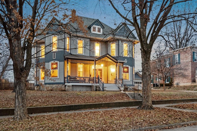 exterior space featuring a garage and covered porch